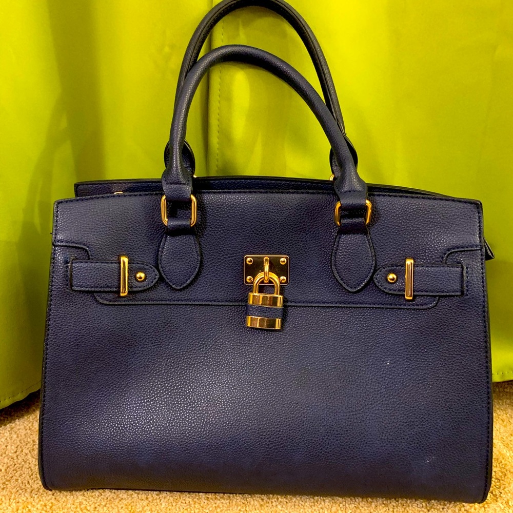 Lovely and Stylish Navy Blue Tote bag smooth leather texture.